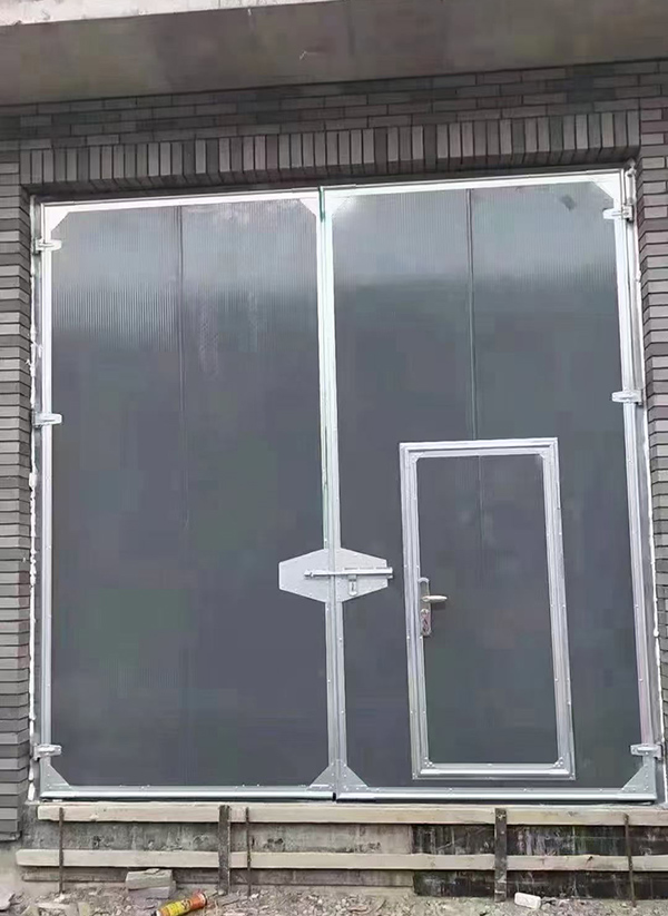 石嘴山工业平开门在大型设备制造车间的应用实例